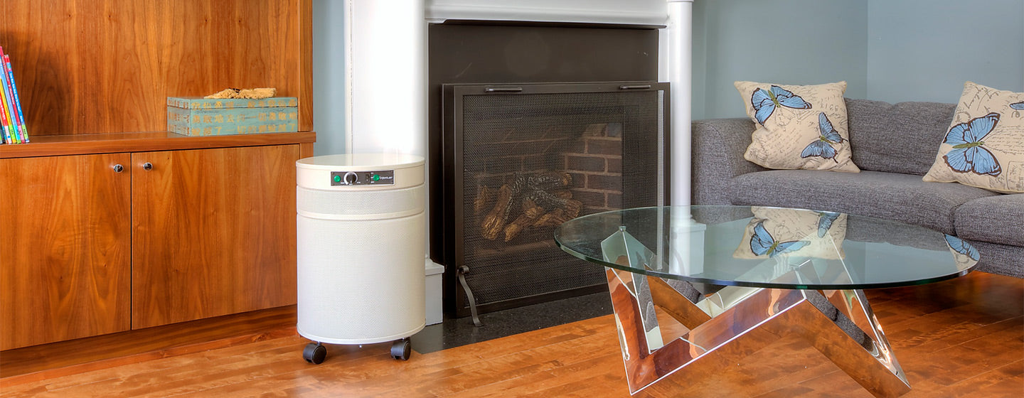 Air Purifier in a living room by a fireplace