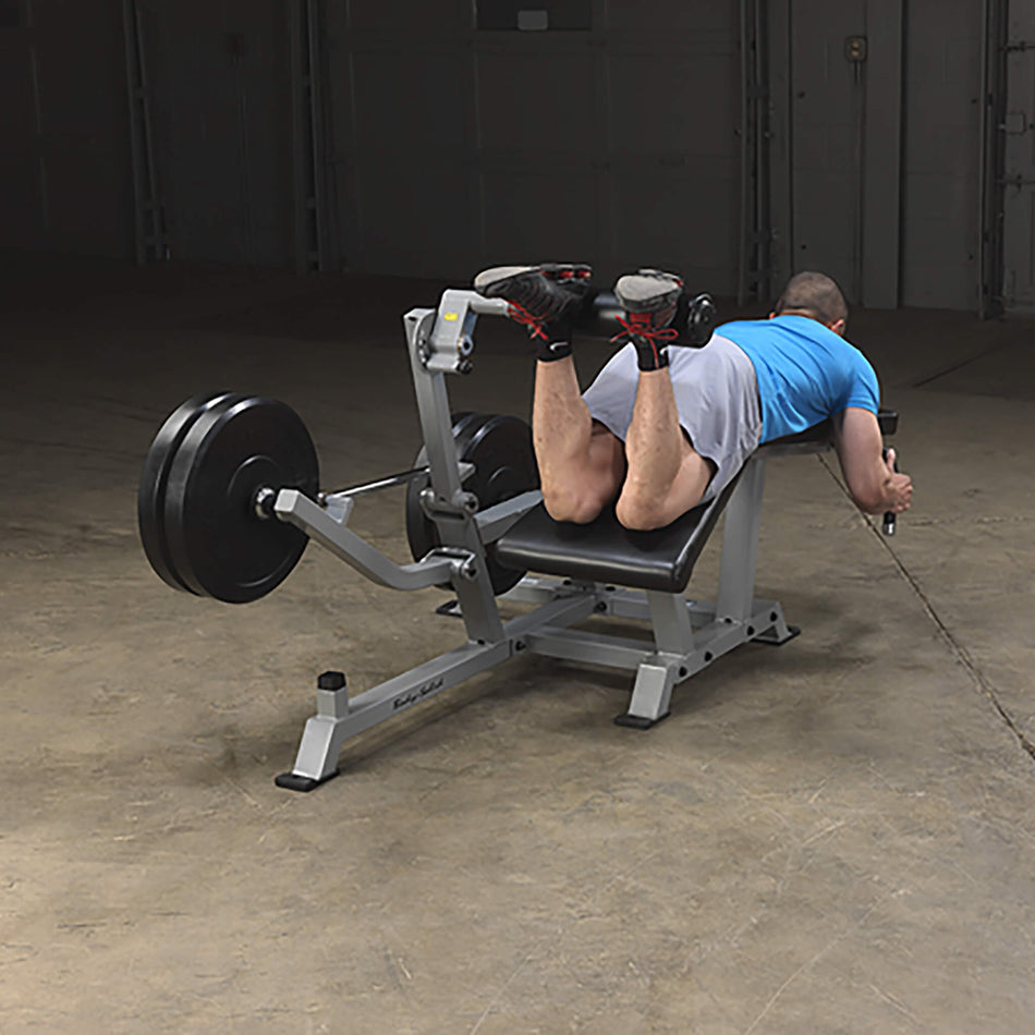 body solid pro clubline lvlc leverage leg curl man leg curl