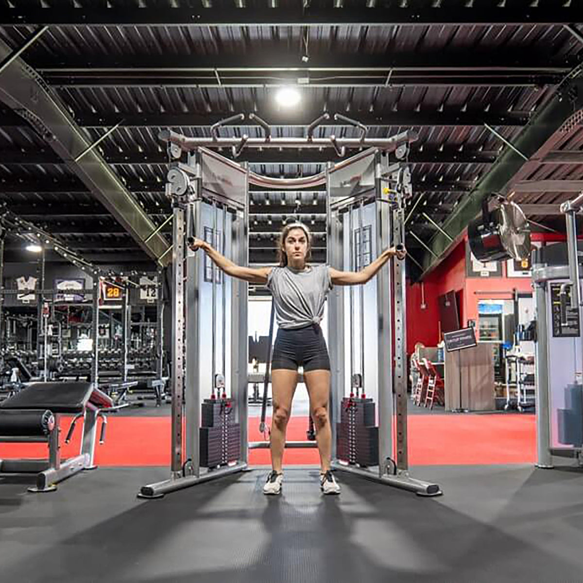 bodykore functional trainer at the gym woman training
