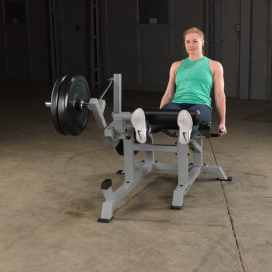 leverage leg extension woman front view leg extended pates lifted