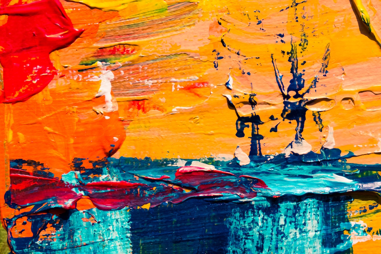 Vibrant oil painting with bold strokes and rich textures, exemplifying the need for an effective air purifier for art studios to maintain clean air from paint fumes.
