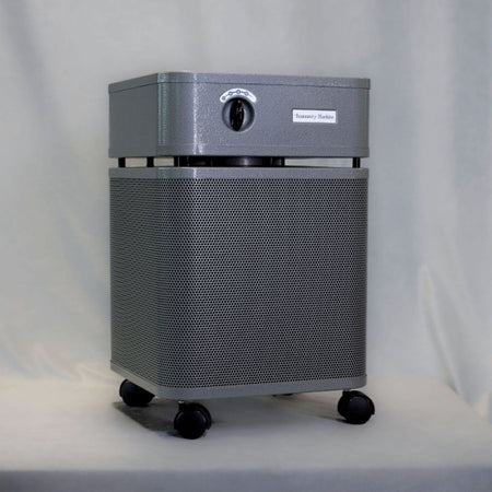 Austin Air Immunity Machine Air Purifier front look with speed knob on caster wheels