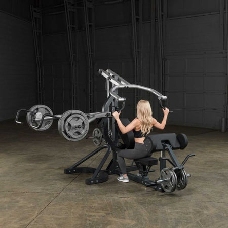 Female User Body Solid SBL460 Freeweight Leverage Gym
