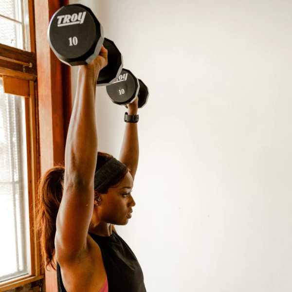 Female User of 12 Sided Urethane Dumbbells TSD-U