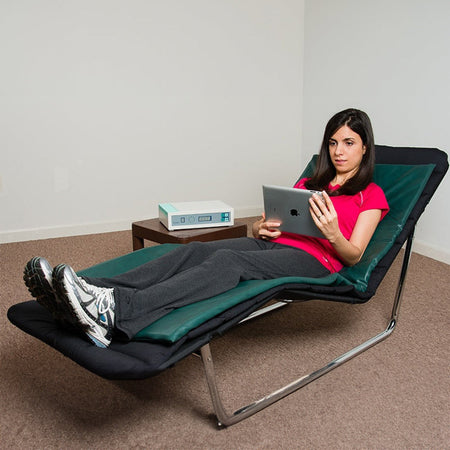 Lady Laying On Curatron Full Body Mat