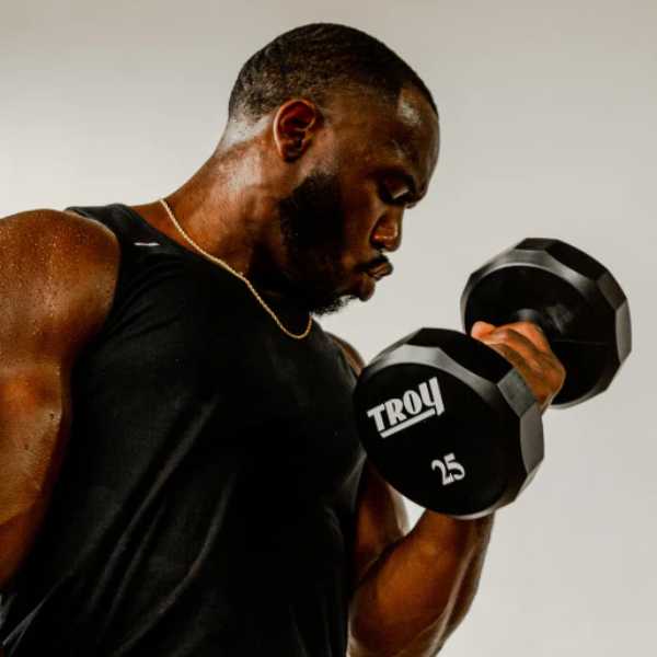 Male User of Urethane 12 Sided Dumbbells
