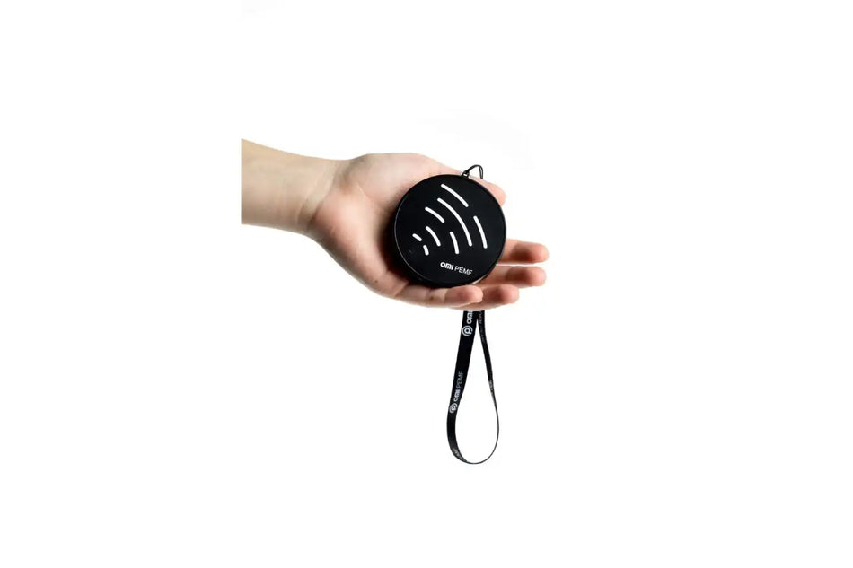 Portable Pemf Device Applicator on the person's hand