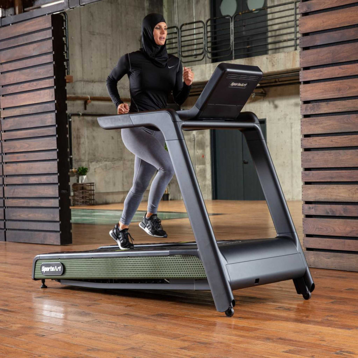 G660 Treadmill by SportsArt Female Workout 