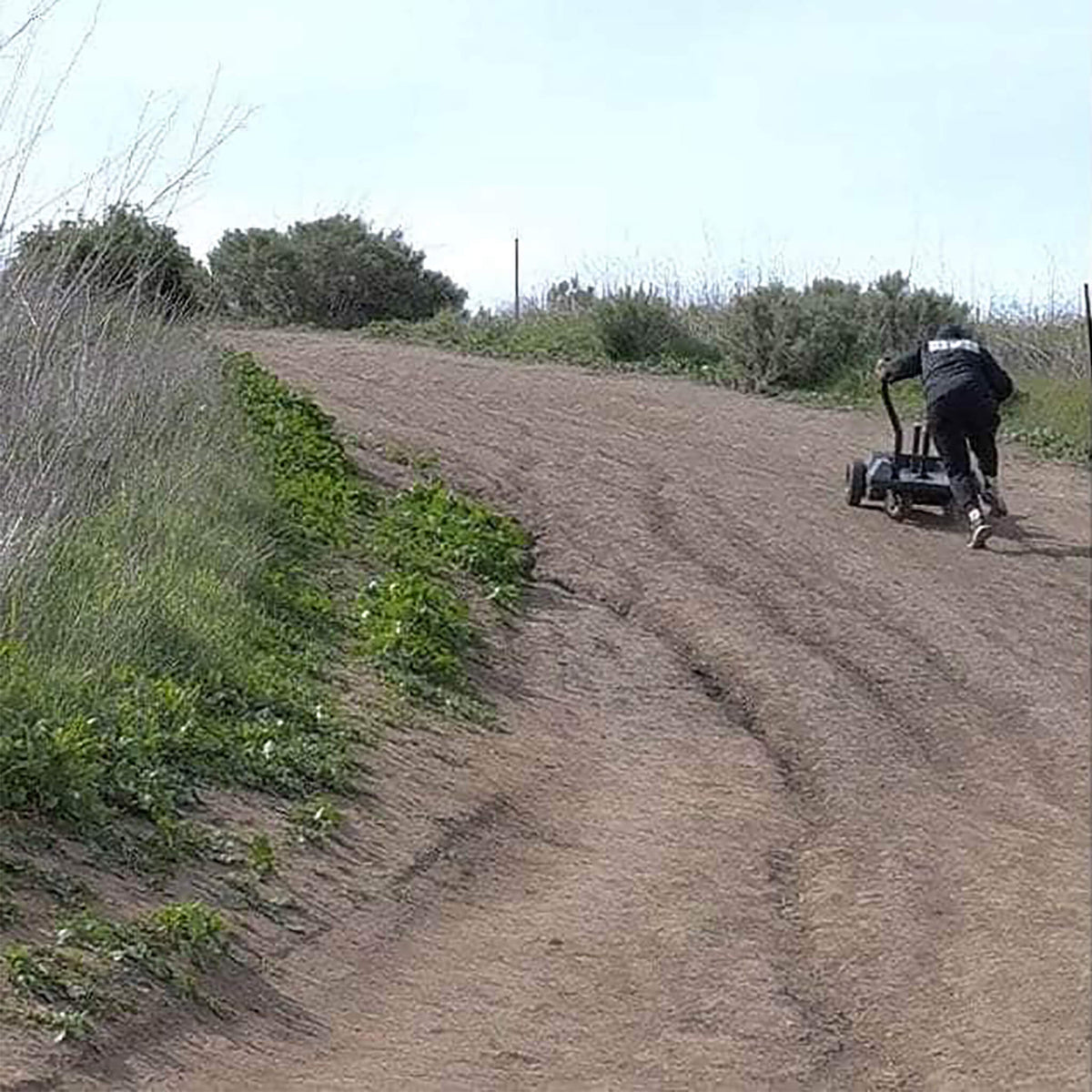bk ss01 smart sled man pushing uphill