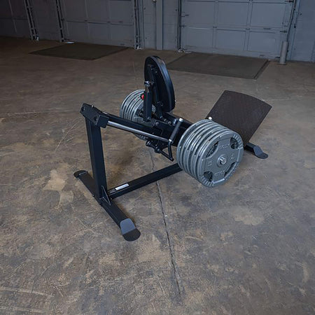body solid compact leg press machine back view with plates