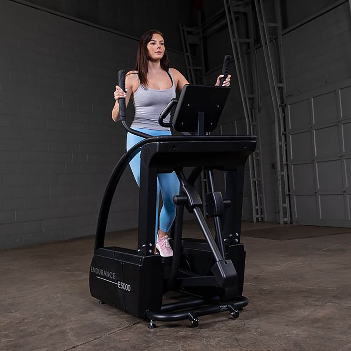 body solid e5000 endurance woman exercise front view