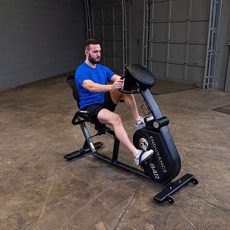 body solid endurance recumbent bike b4rb corner view with model