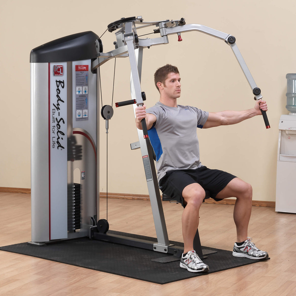 body solid s2pec pro clubline series ii pec deck and rear delt showing pec fly exercise