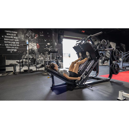 bodykore fl1801 leg press woman exercising