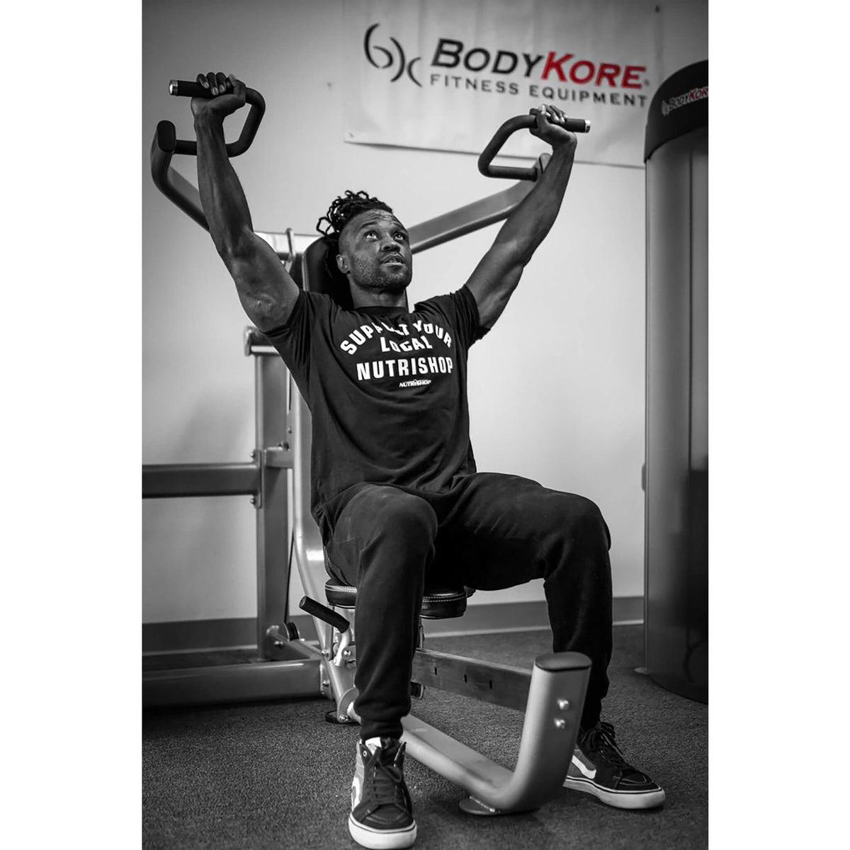 bodykore gr640 multipress man exercising