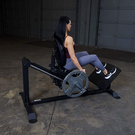 compact leg press gclp100 woman back view