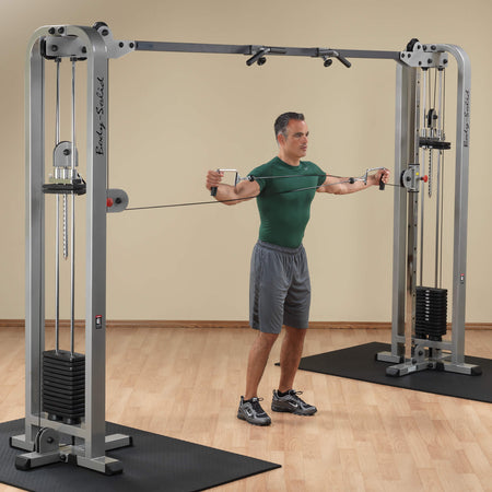 pro clubline cable crossover machine standing reverse fly