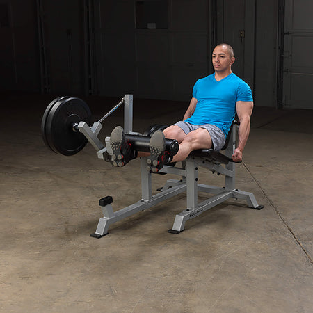 pro clubline leverage leg extension lvle man corner view leg extended with plates