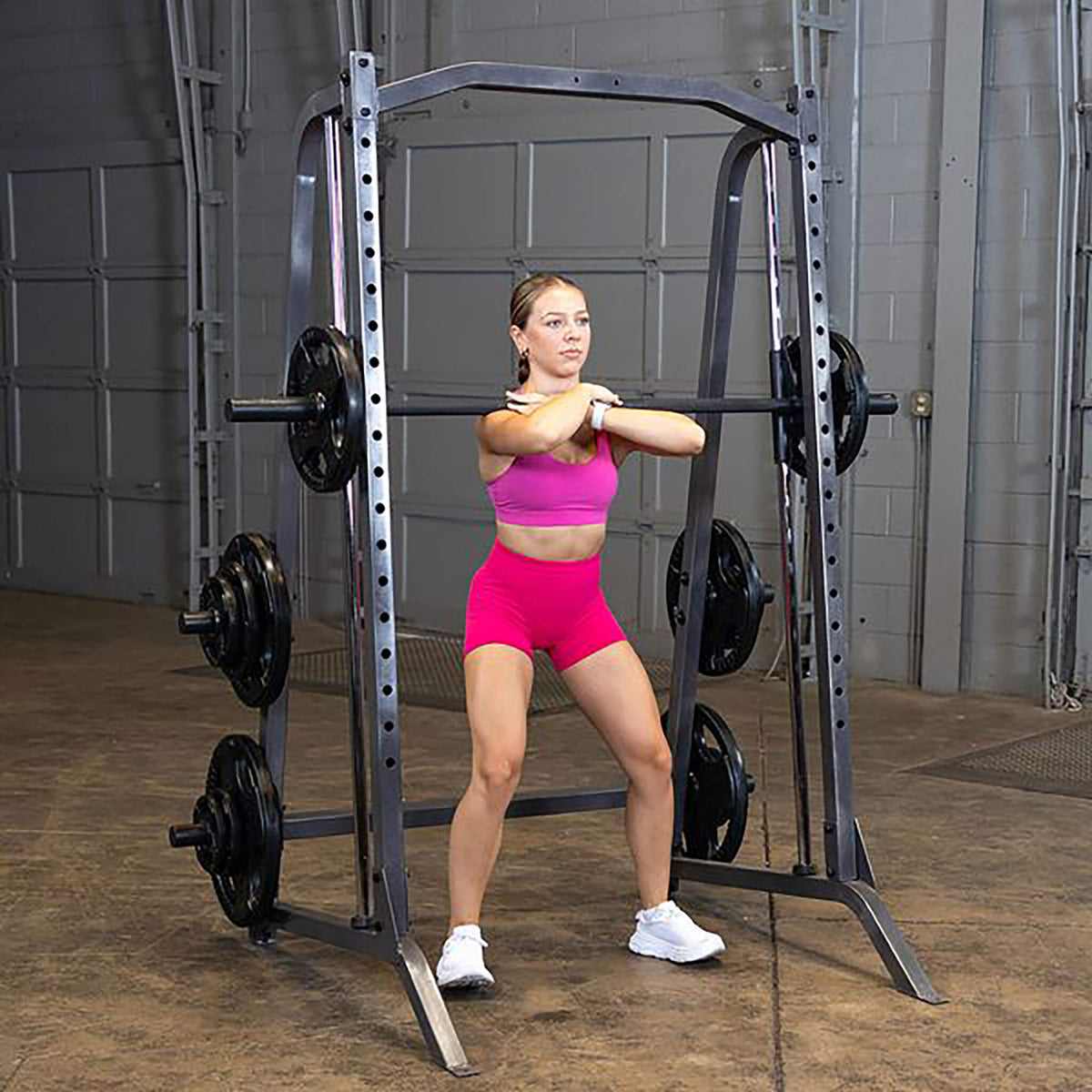 smith machine psm200 standing with arms crossed